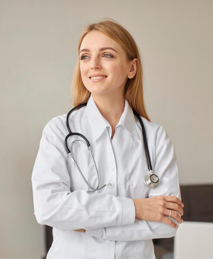 front-view-smiley-covid-recovery-center-female-doctor (1)